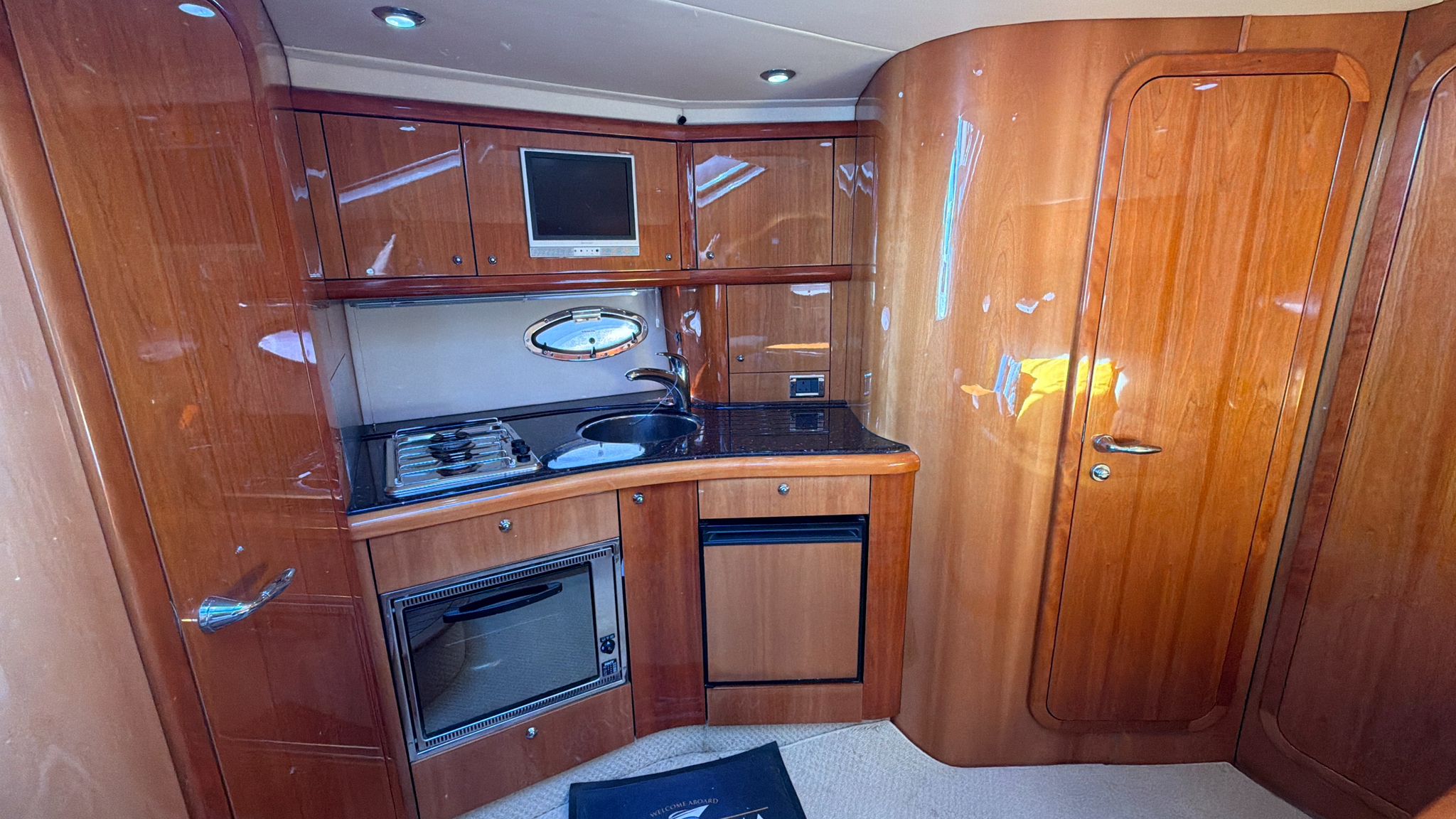 Galley close-up with oven and fridge